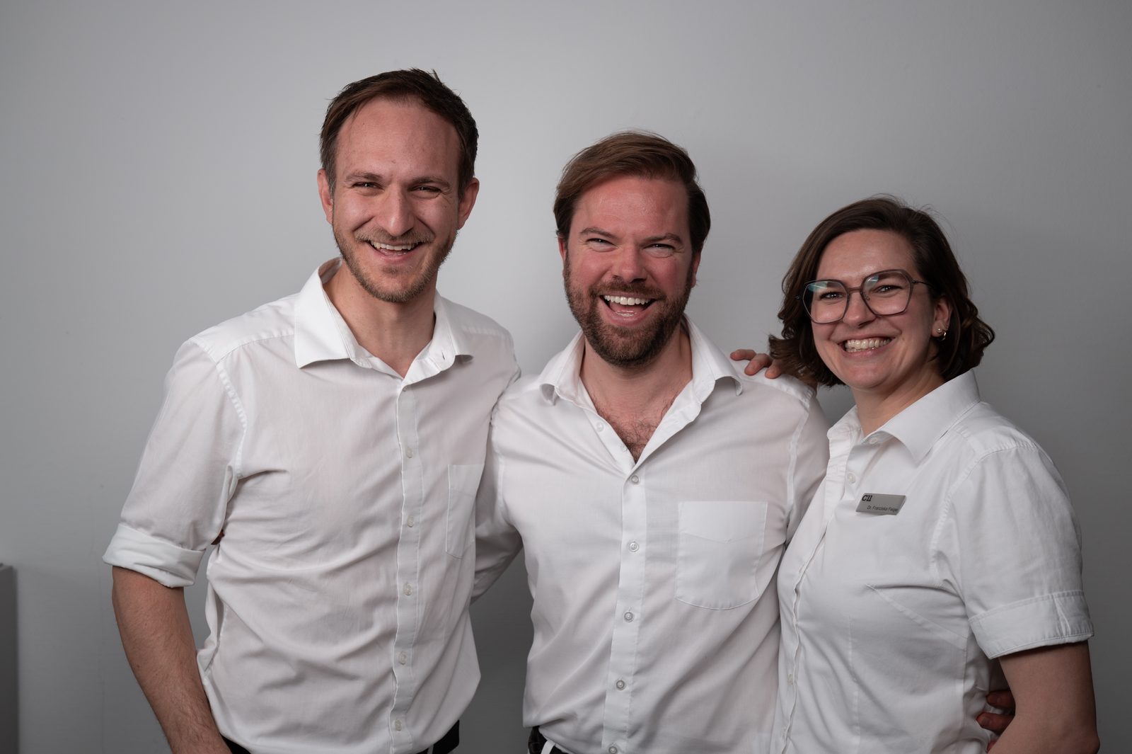 Drei Kolleginnen und Kollegen des C11-Teams